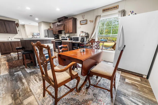 a view of a hallway with wooden shelves