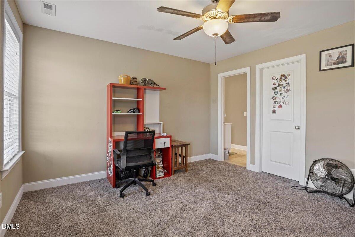 1001 Bellewood Farms Road Raleigh, NC 27603 - Photo 36 of 39 a view of a workspace with furniture