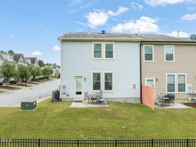 a view of a house with swimming pool