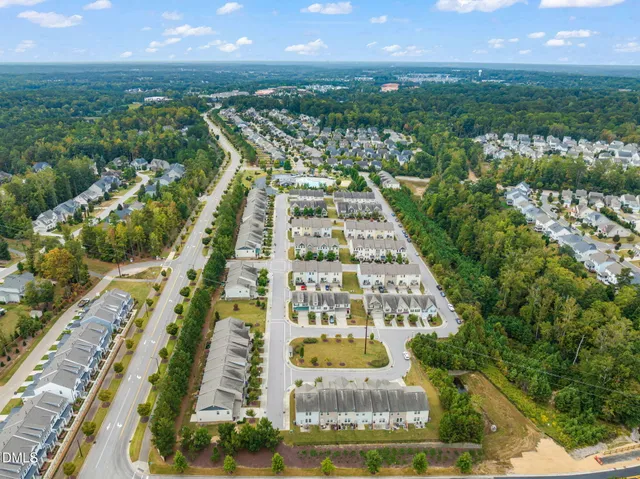 an aerial view of a house with a garden