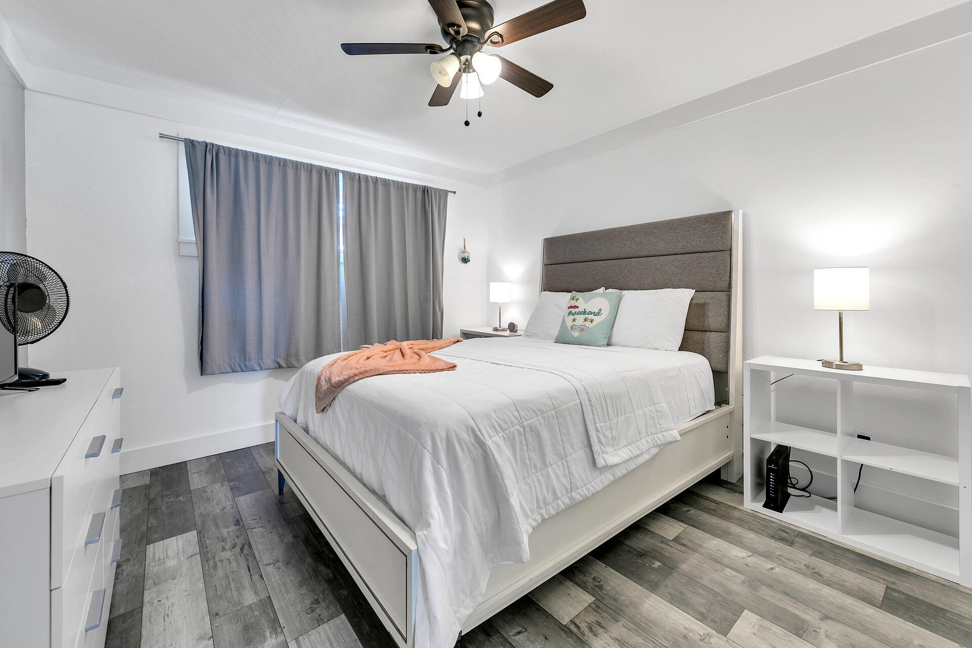 Undisclosed Address Destin, FL 32541 - Photo 19 of 23 a bedroom with bed and a chandelier