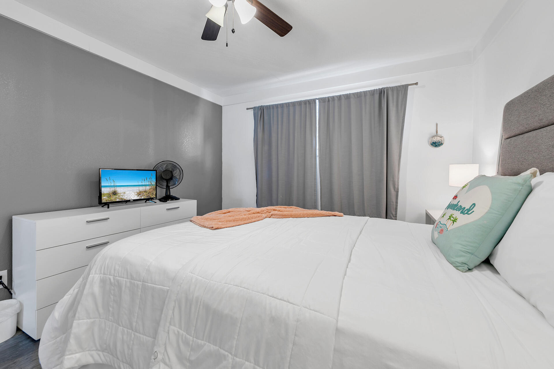 Undisclosed Address Destin, FL 32541 - Photo 20 of 23 a bedroom with a bed and ceiling fan