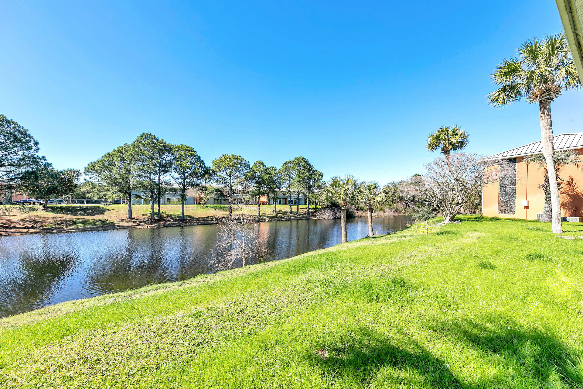 Undisclosed Address Destin, FL 32541 - Photo 22 of 23 a view of a yard with a lake view