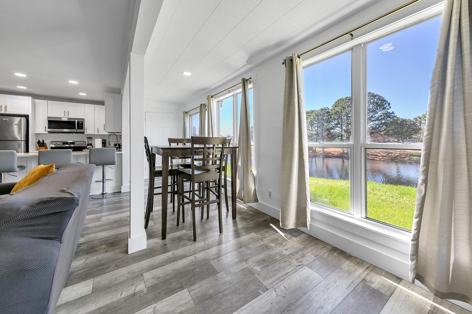 Undisclosed Address Destin, FL 32541 - Photo 5 of 23 a view of a dining area with furniture window and outside view