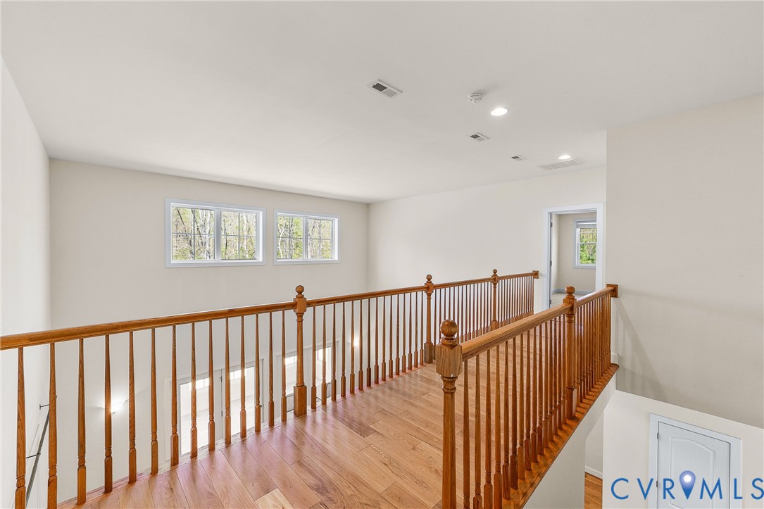 15430 River Road Chesterfield, VA 23838 - Photo 22 of 46 a view of a hallway with wooden floor and windows