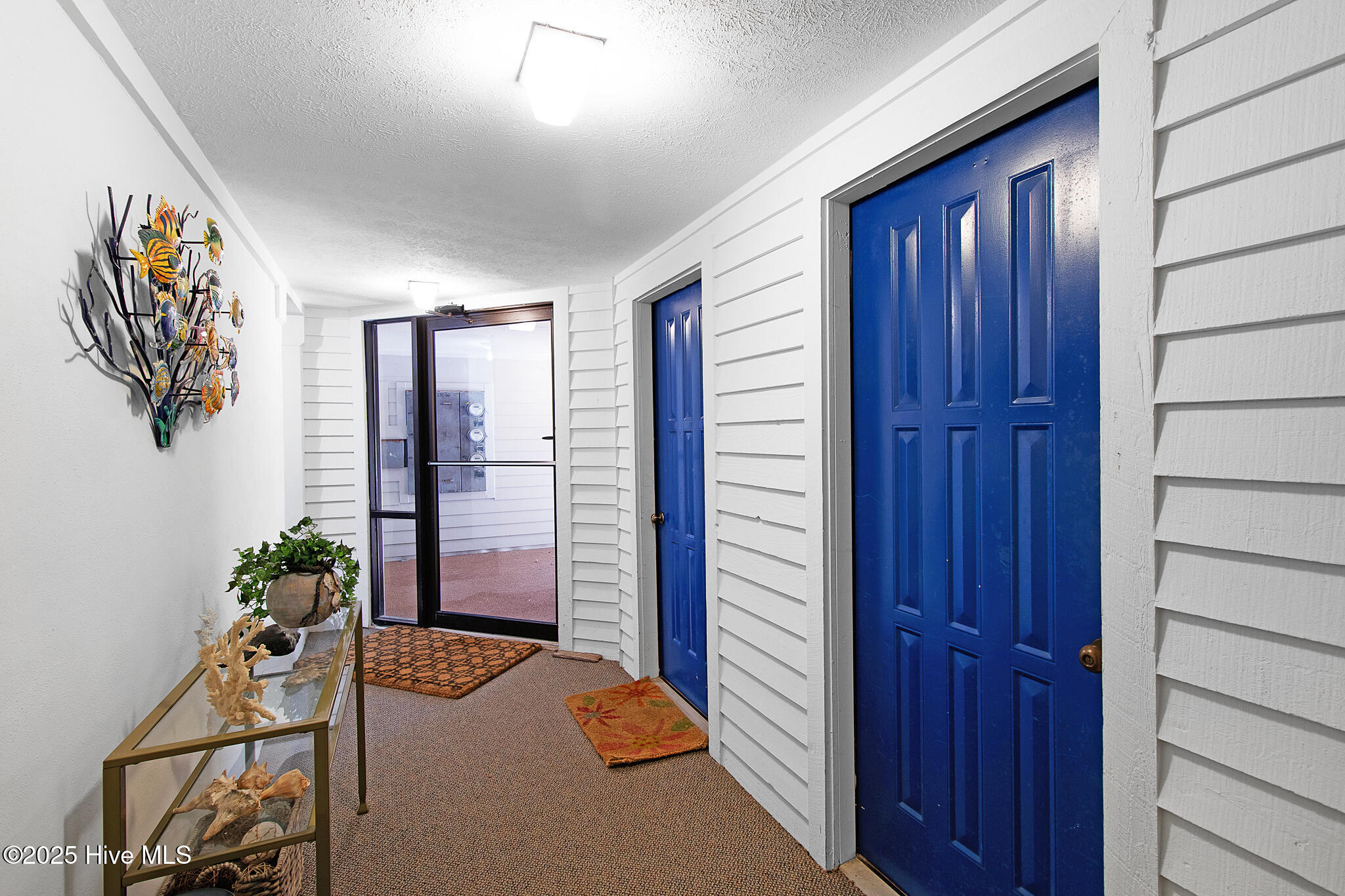301 Salter Path Road, Unit 12 GENESIS Pine Knoll Shores, NC 28512 - Photo 34 of 47 Interior Hallway