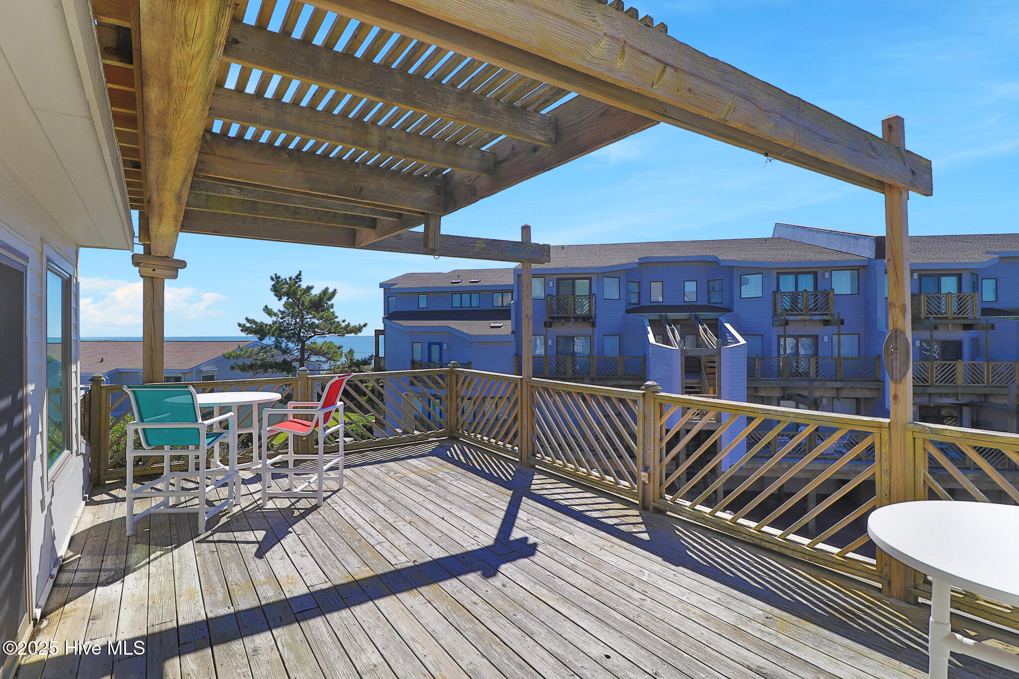 301 Salter Path Road, Unit 12 GENESIS Pine Knoll Shores, NC 28512 - Photo 6 of 47 Spacious Deck with Ocean Views