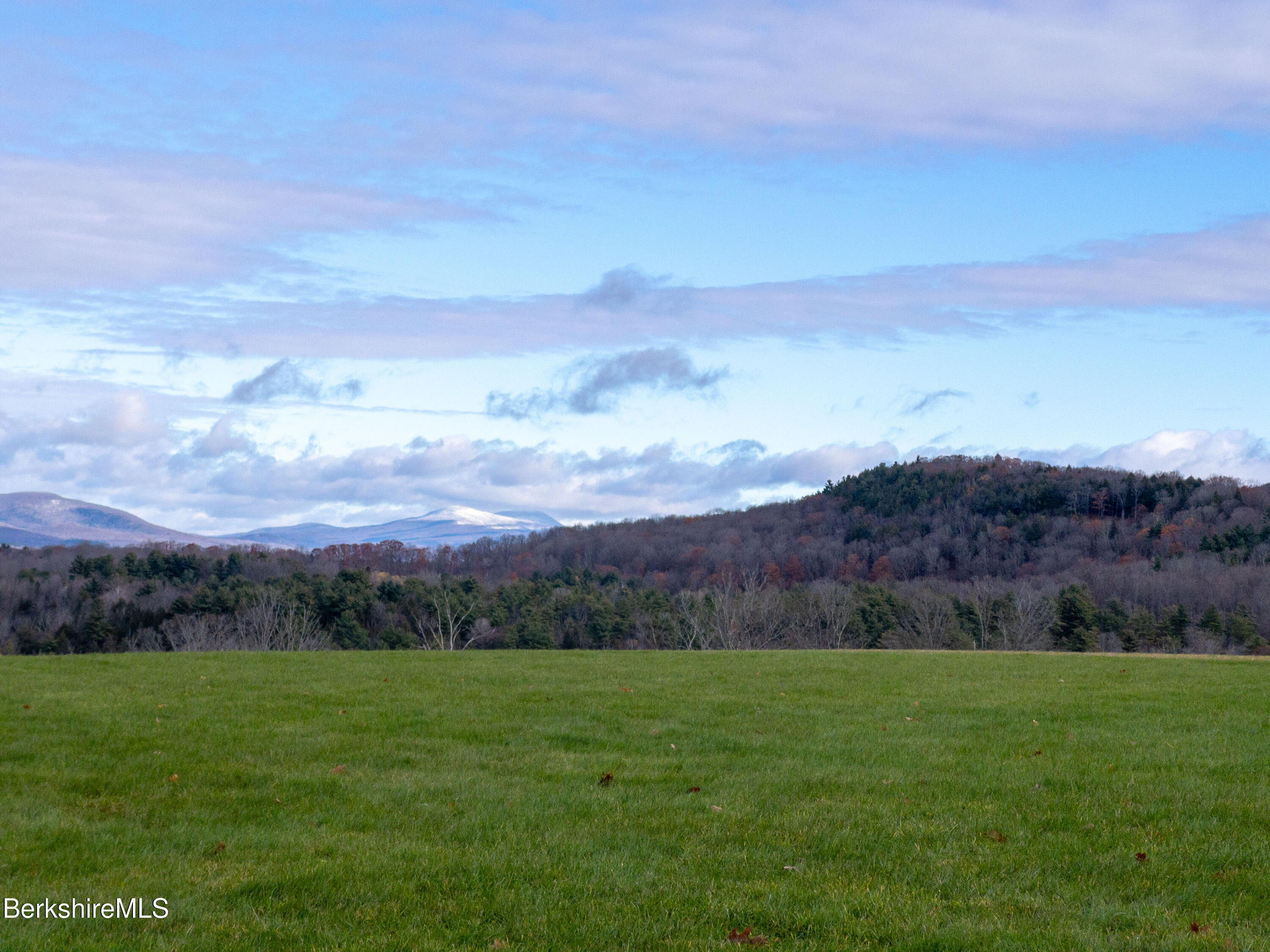 1130 E Road Richmond, MA 01254 - Photo 36 of 53 an aerial view of green landscape with trees