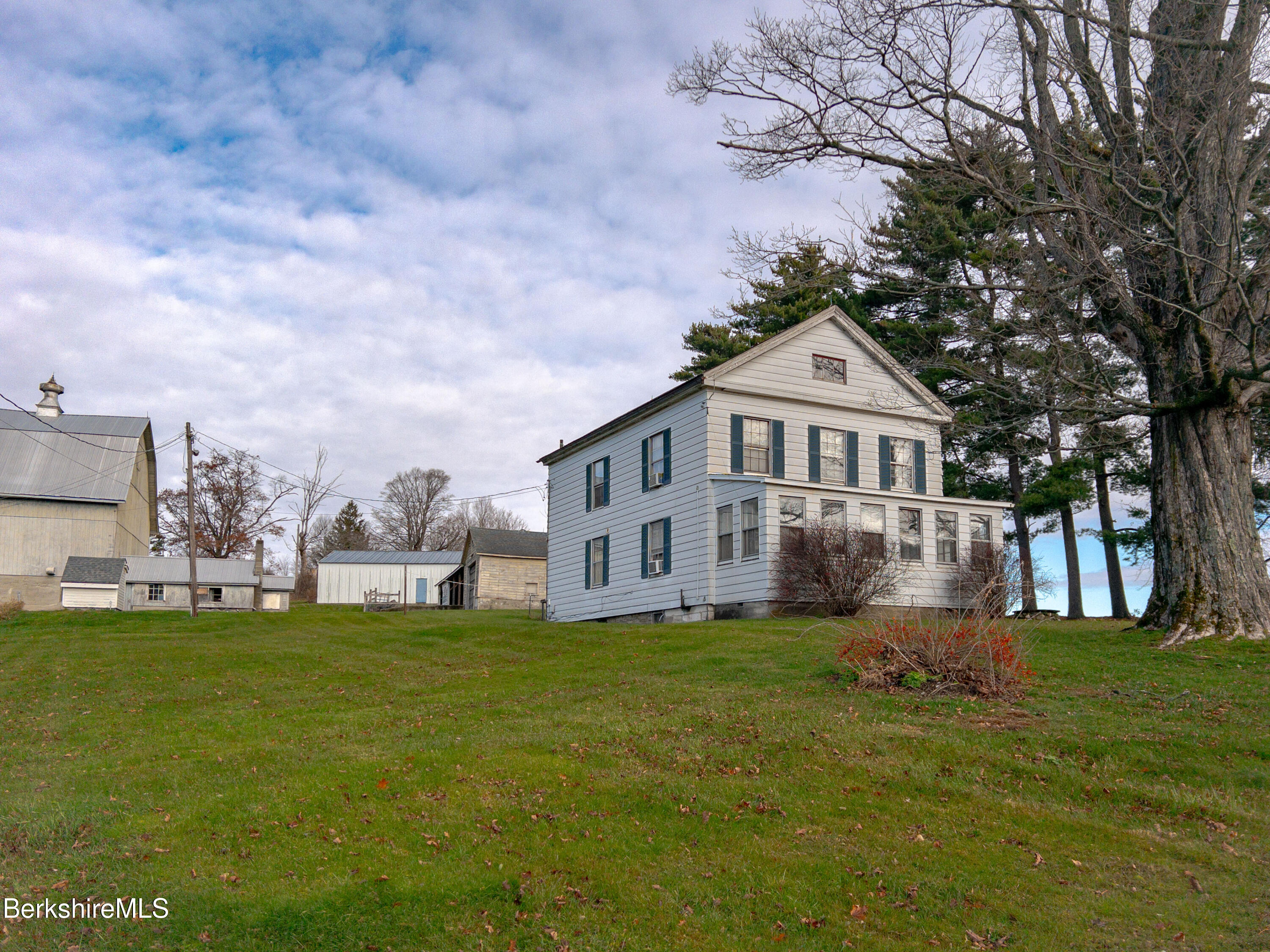 1130 E Road Richmond, MA 01254 - Photo 8 of 53 a front view of a house with a garden