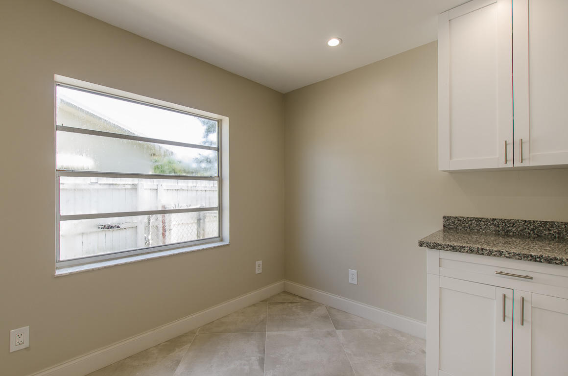 22710 Family Circle Boca Raton, FL 33428 - Photo 15 of 28 a view of kitchen with window