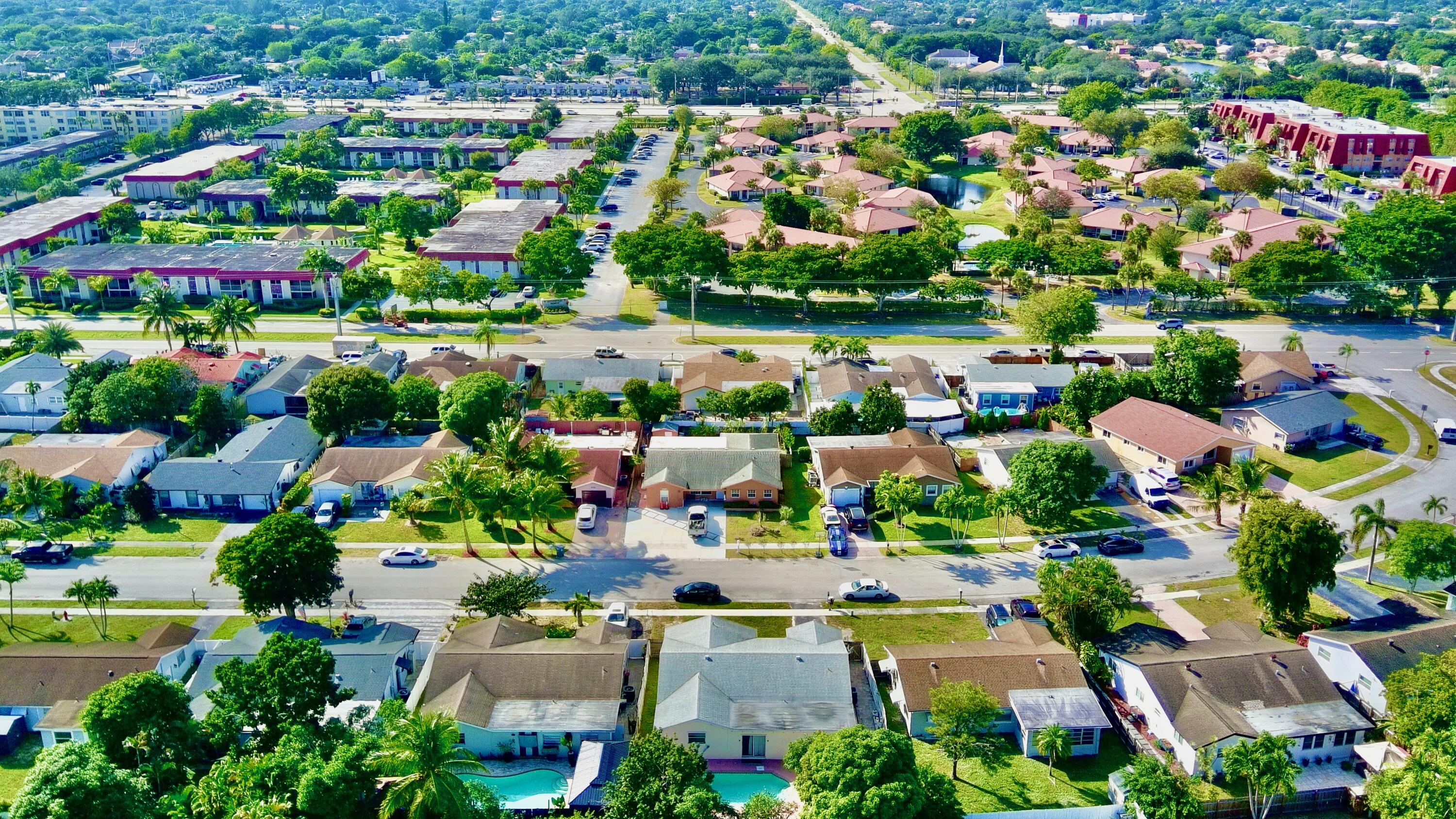22710 Family Circle Boca Raton, FL 33428 - Photo 3 of 28 an aerial view of a houses and an outdoor space