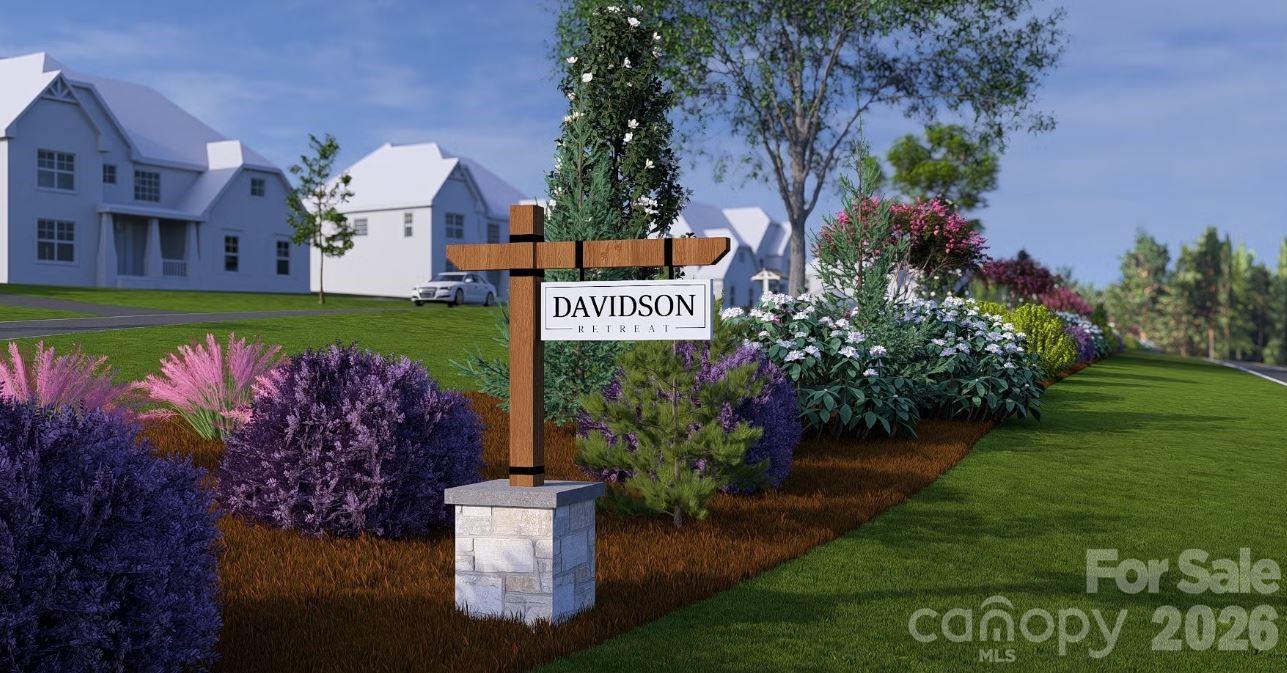 106 Willow Vw Loop Davidson, NC 28036 - Photo 4 of 6 a sign that is sitting in front of a house