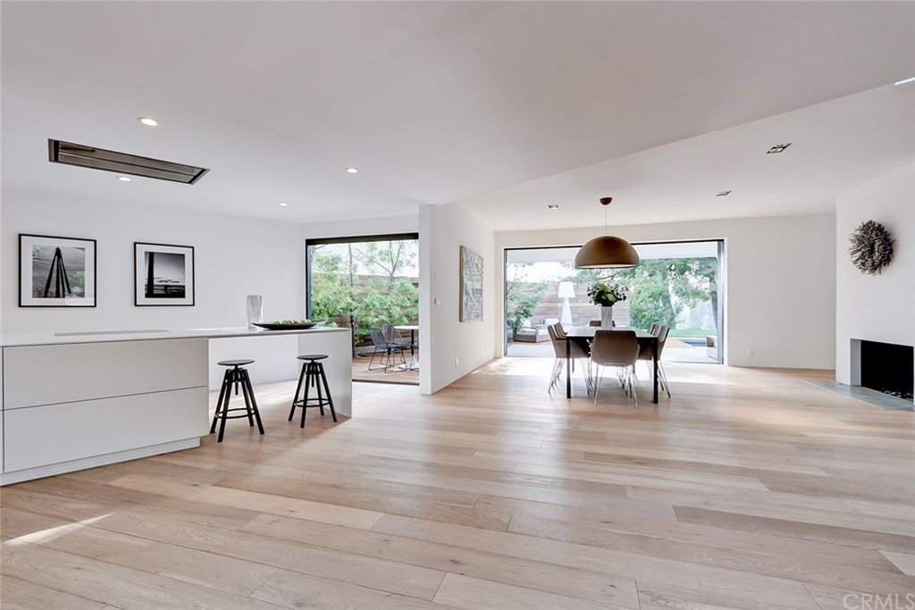 4413 Grimes Place Encino, CA 91316 - Photo 5 of 26 a living room with furniture and a wooden floor