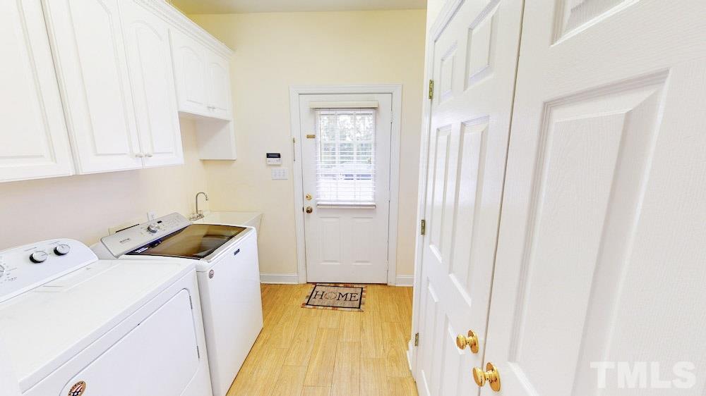 1560 Beasley Road Benson, NC 27504 - Photo 14 of 27 a room with storage and utility