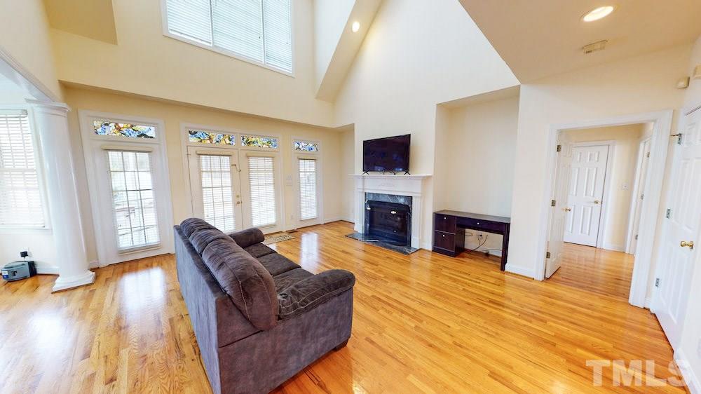 1560 Beasley Road Benson, NC 27504 - Photo 7 of 27 a living room with furniture window and a flat screen tv