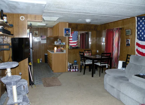a kitchen with a sink stove and refrigerator