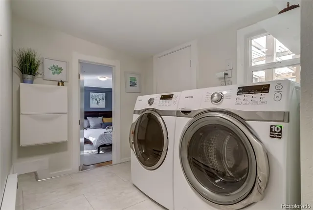 a utility room with dryer and washer