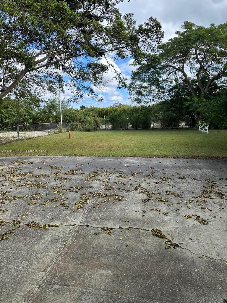 19191 Southwest 232nd Street Miami, FL 33170 - Photo 5 of 10 a view of a field with large trees