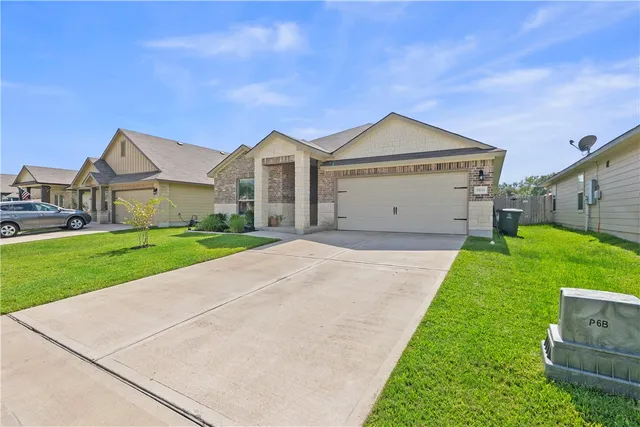 a view of outdoor space yard and garage