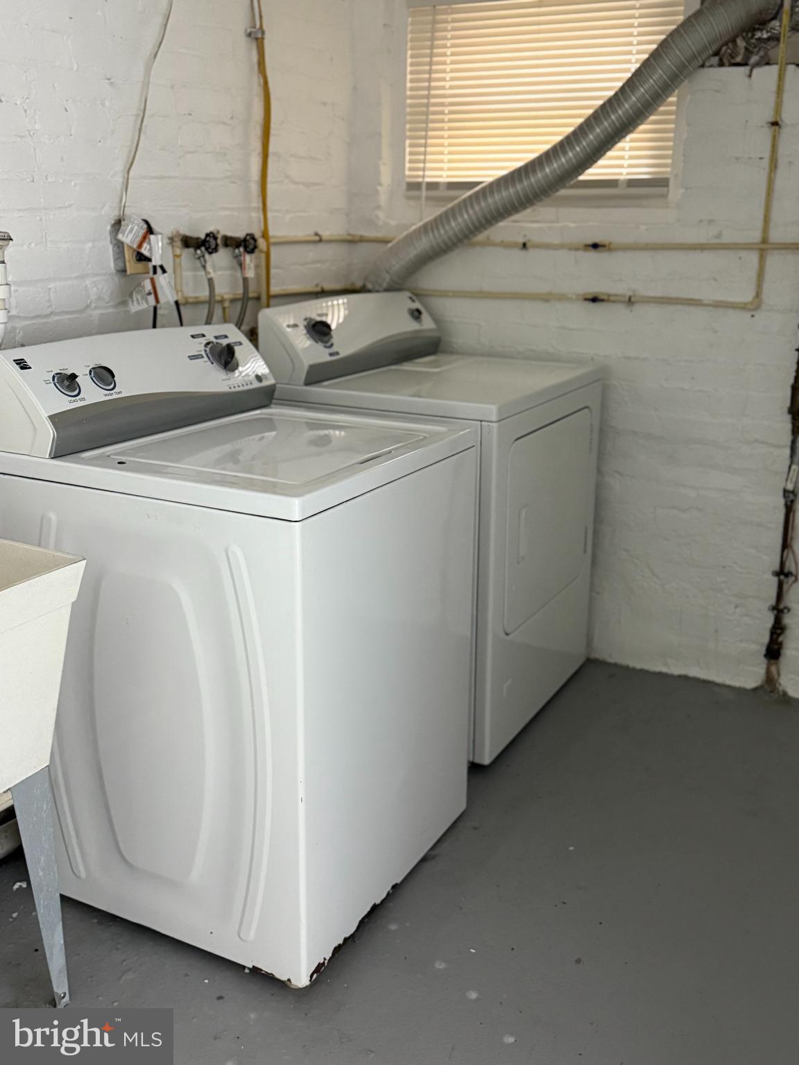 2807 Presstman Street Baltimore, MD 21216 - Photo 5 of 24 a bathroom with a sink and a mirror