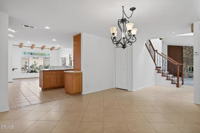 a kitchen with a sink stove and microwave