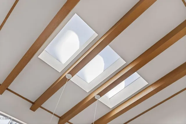 a view of kitchen and windows