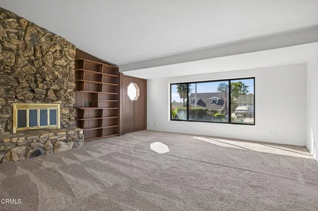 a view of a kitchen with furniture and a chandelier