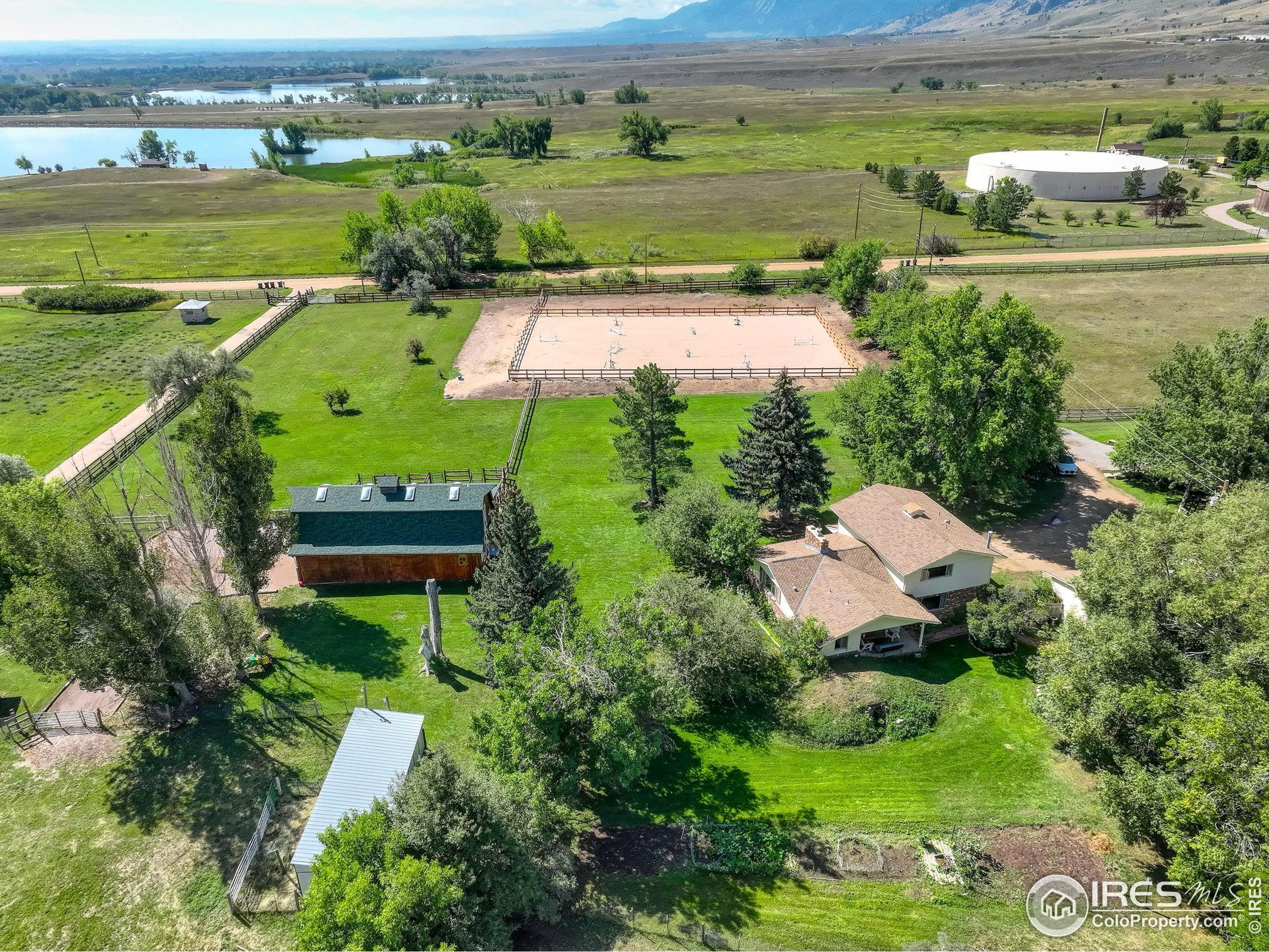 3625 Nimbus Road Longmont, CO 80503 - Photo 1 of 48 an aerial view of a house with a lake view
