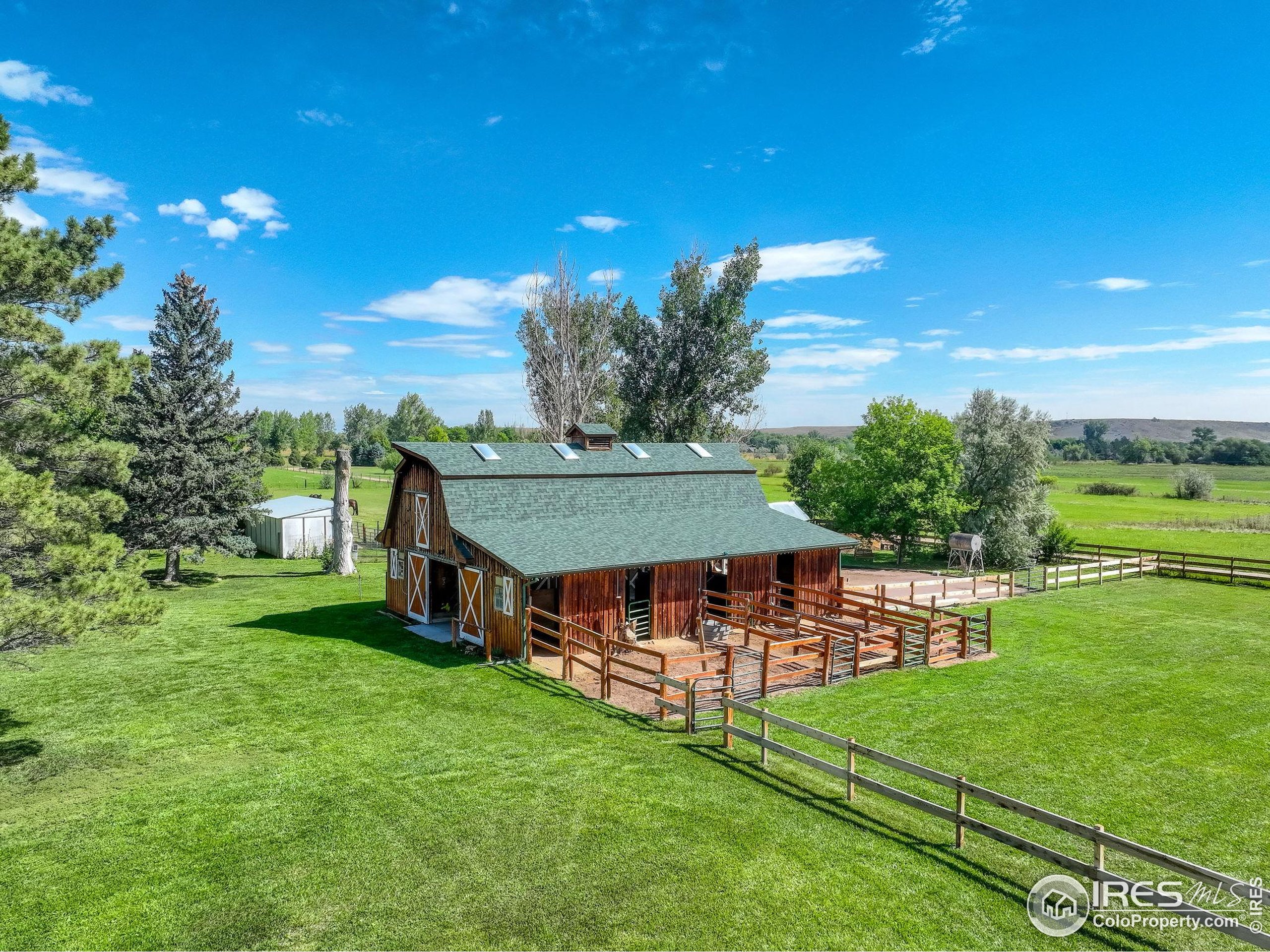 3625 Nimbus Road Longmont, CO 80503 - Photo 2 of 48 a view of a house with a big yard