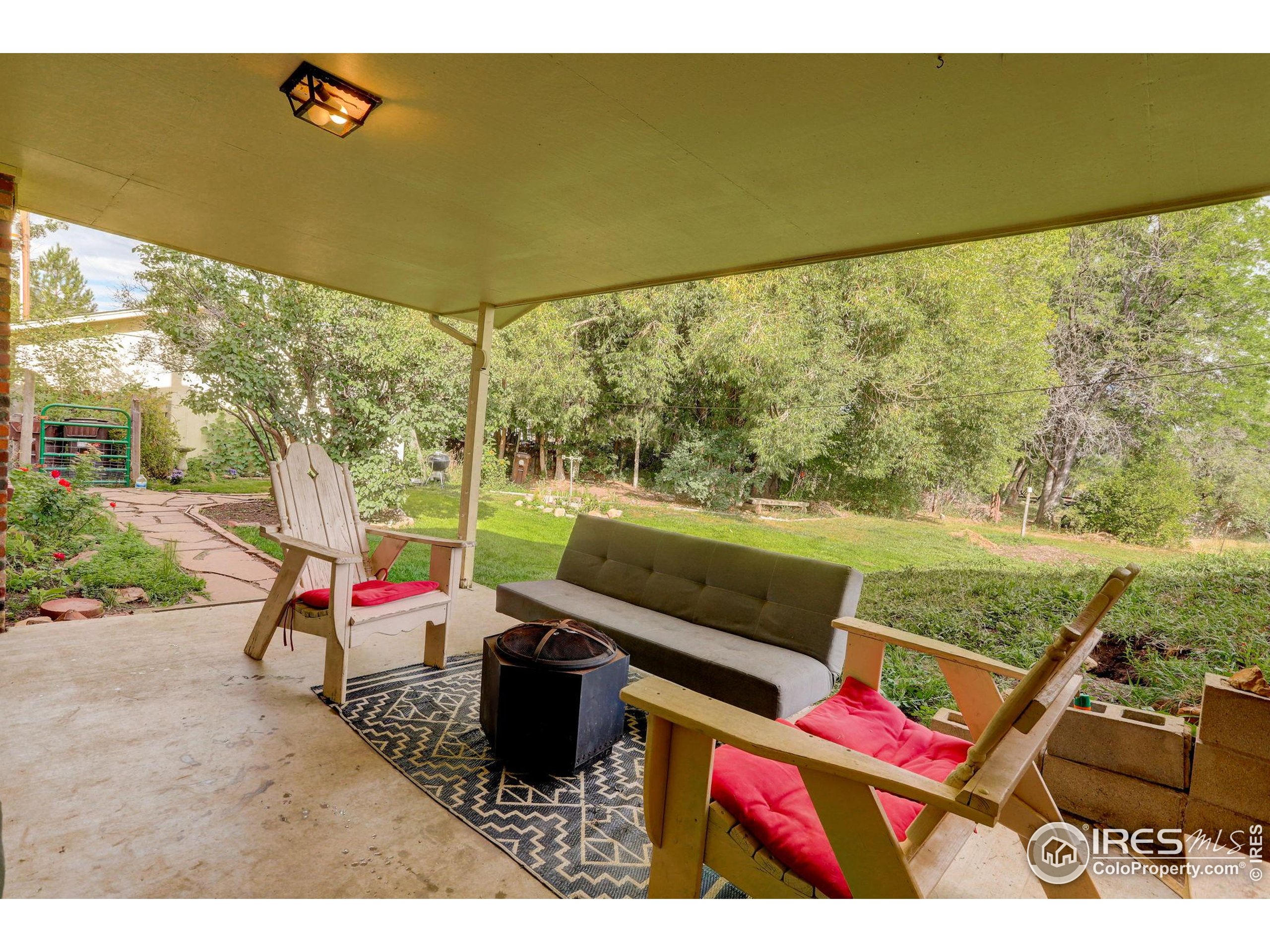 3625 Nimbus Road Longmont, CO 80503 - Photo 22 of 48 a view of a floor to ceiling window and a table