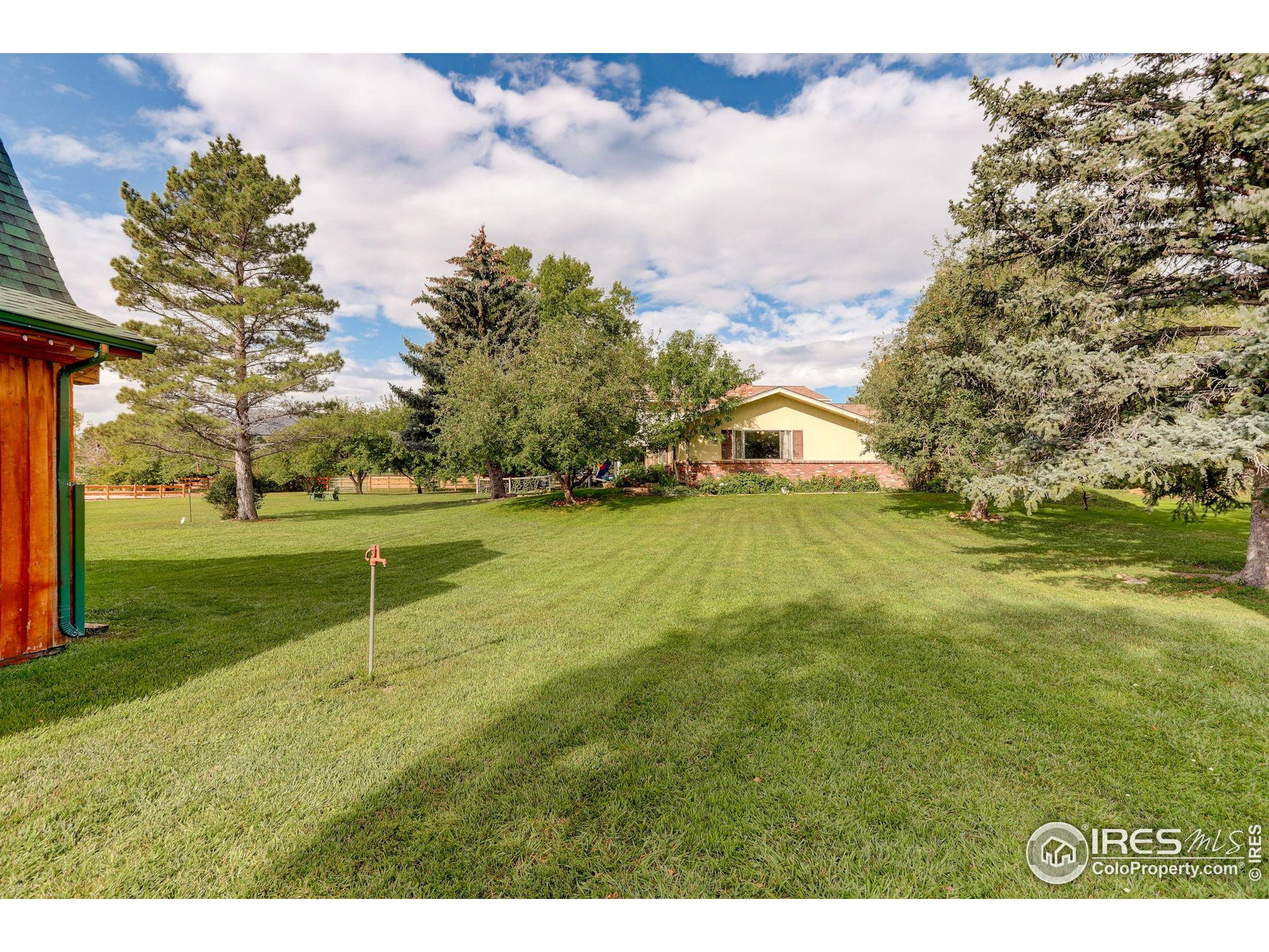 3625 Nimbus Road Longmont, CO 80503 - Photo 37 of 48 a view of a park with large trees