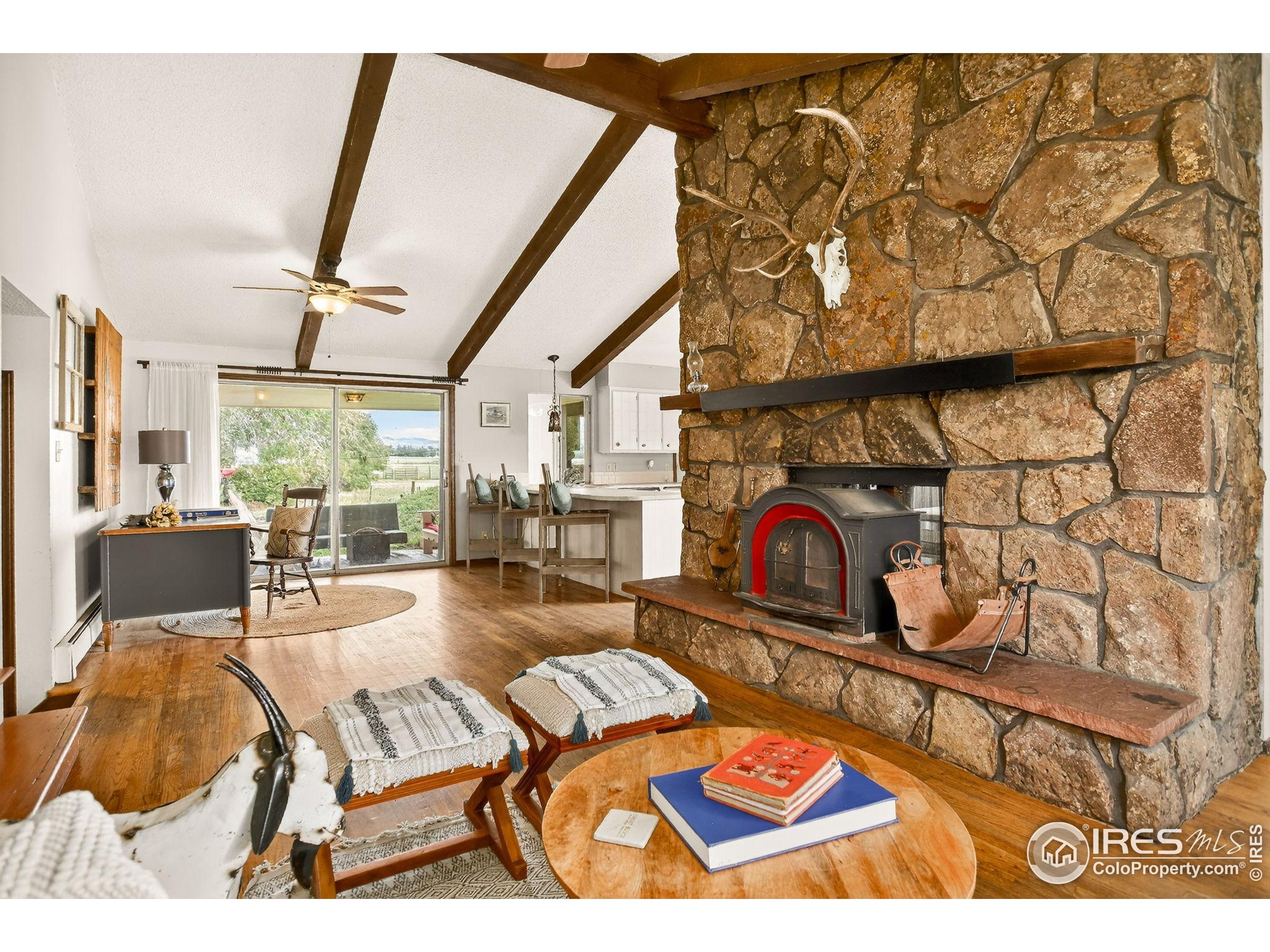 3625 Nimbus Road Longmont, CO 80503 - Photo 10 of 48 a view of a living room and dining room