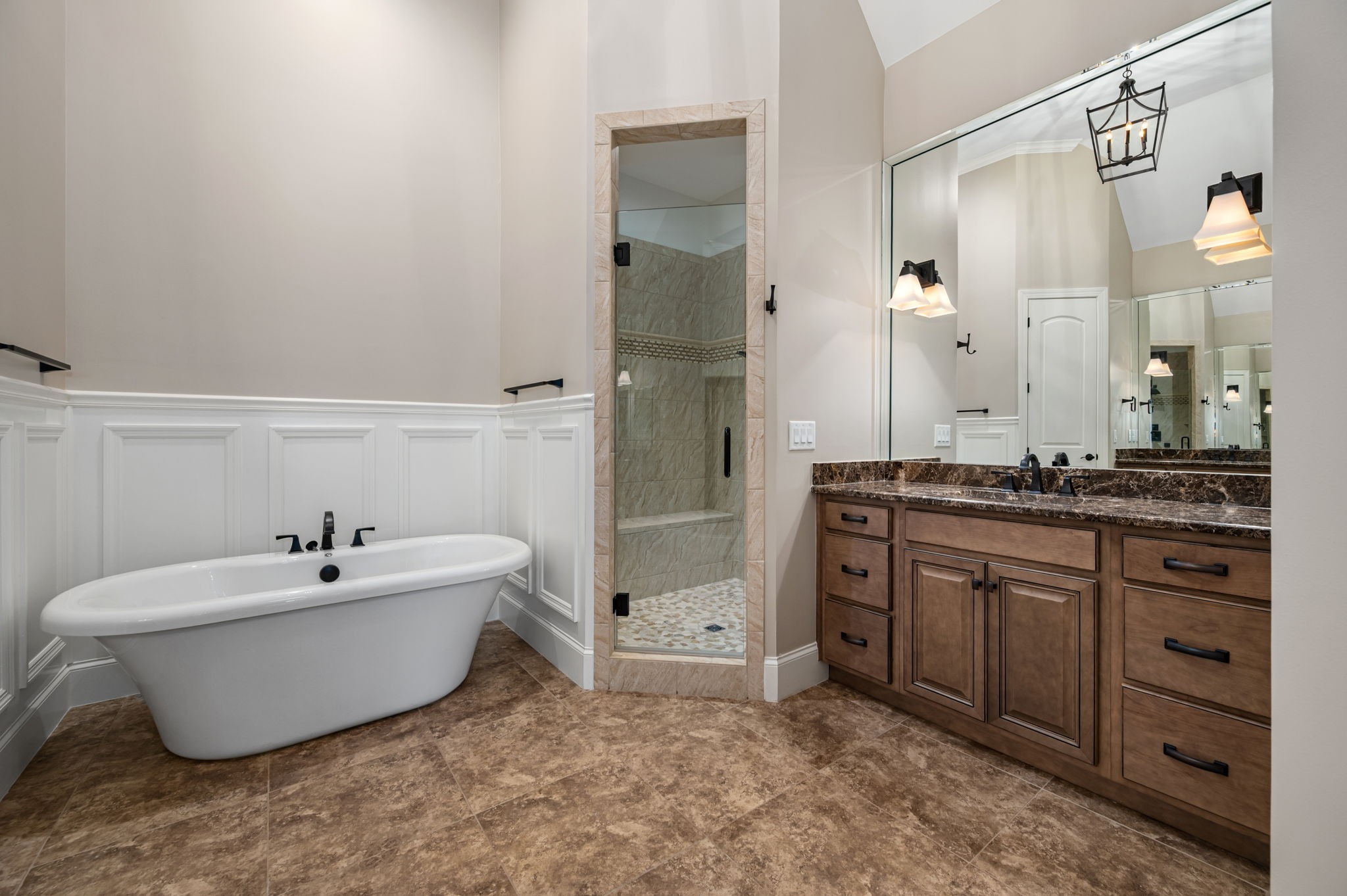 4016 Pinwheel Court Arrington, TN 37014 - Photo 17 of 47 a spacious bathroom with a bathtub sink and mirror