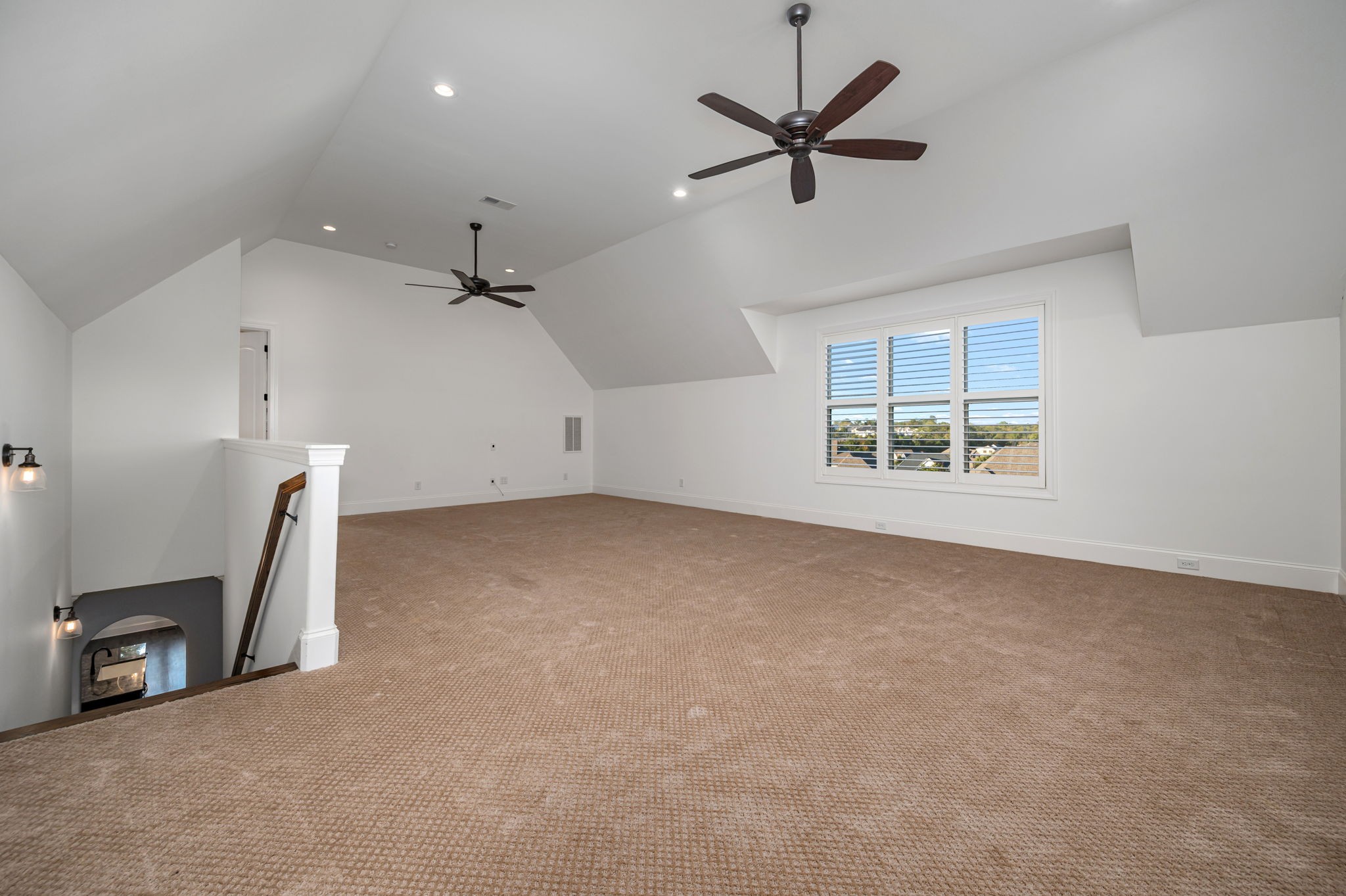 4016 Pinwheel Court Arrington, TN 37014 - Photo 23 of 47 an empty room with a ceiling fan and window
