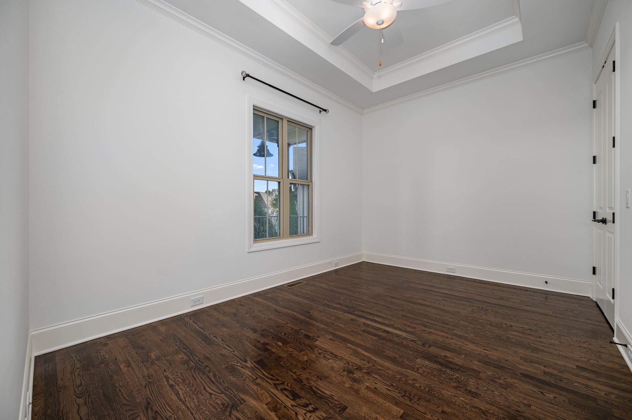 4016 Pinwheel Court Arrington, TN 37014 - Photo 26 of 47 wooden floor in an empty room with a window