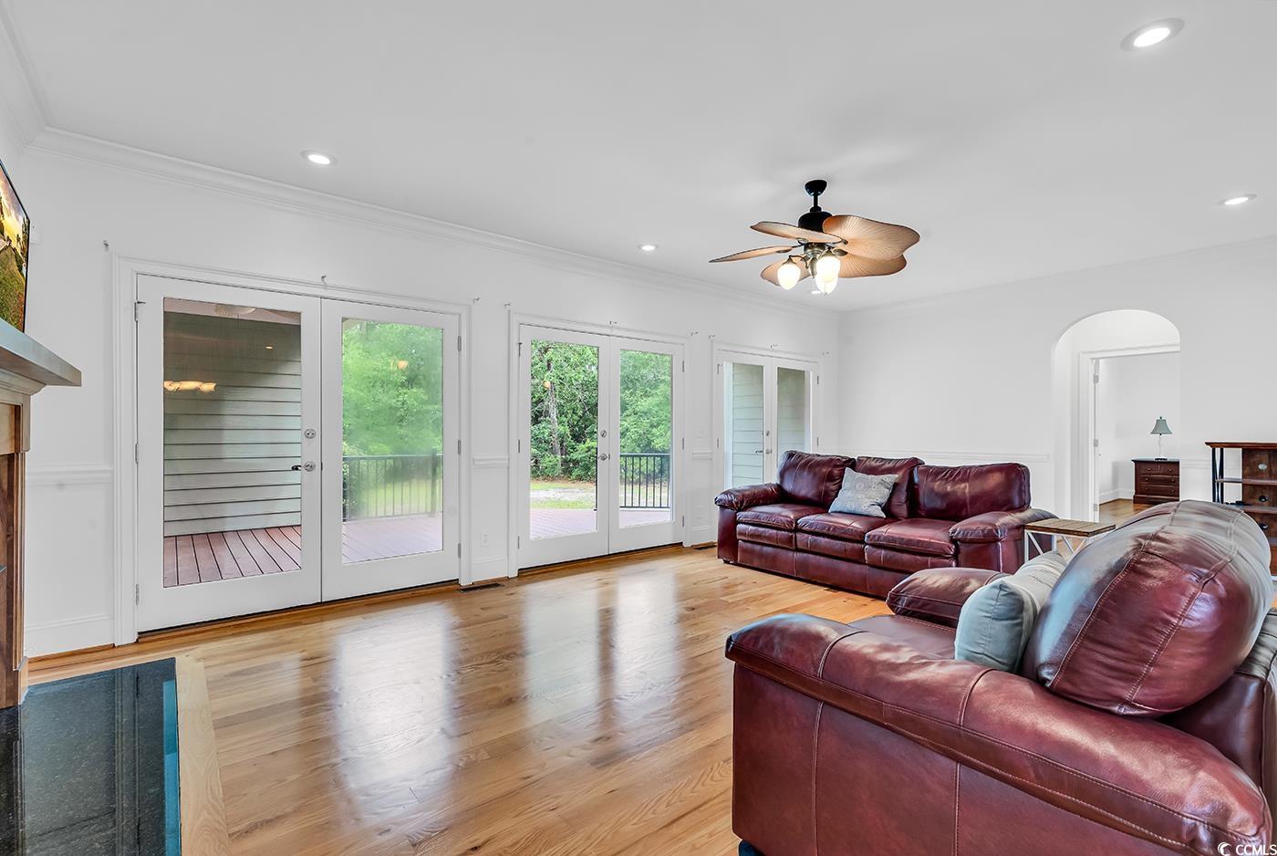 70 Highwood Circle Murrells Inlet, SC 29576 - Photo 11 of 40 Living room with light hardwood / wood-style floor