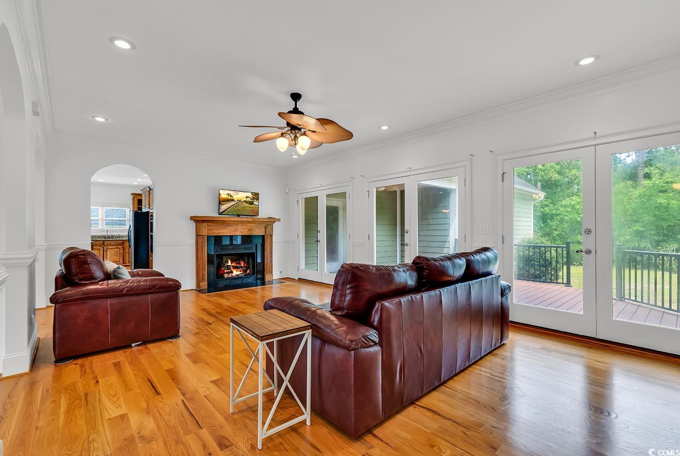 70 Highwood Circle Murrells Inlet, SC 29576 - Photo 12 of 40 Living room featuring light wood-type flooring, ce