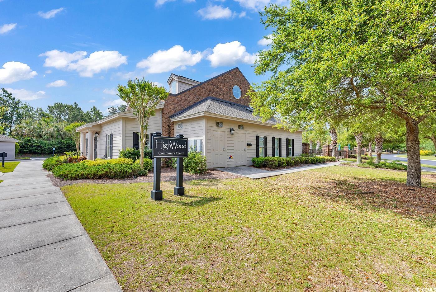 70 Highwood Circle Murrells Inlet, SC 29576 - Photo 40 of 40 View of home's exterior featuring a lawn
