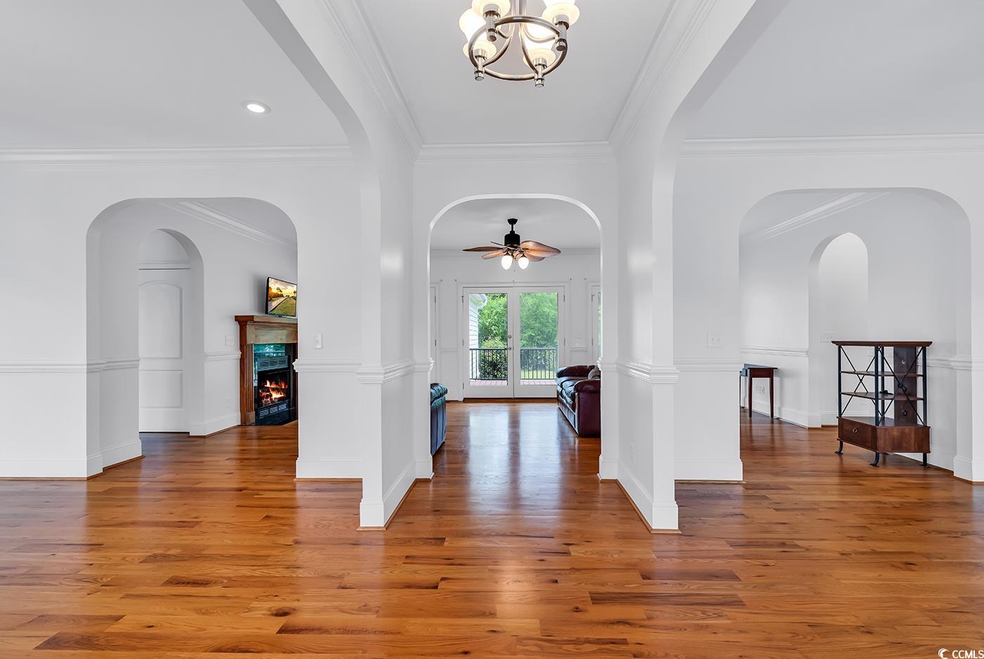 70 Highwood Circle Murrells Inlet, SC 29576 - Photo 7 of 40 Entryway featuring ceiling fan with notable chande