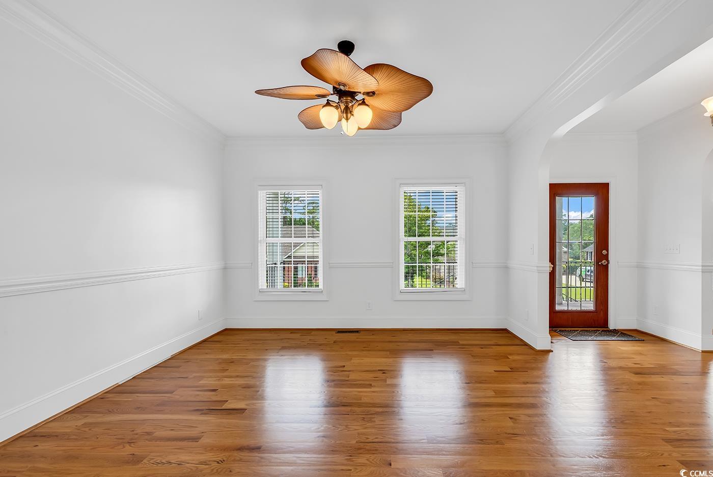 70 Highwood Circle Murrells Inlet, SC 29576 - Photo 8 of 40 Empty room with ornamental molding, ceiling fan, a