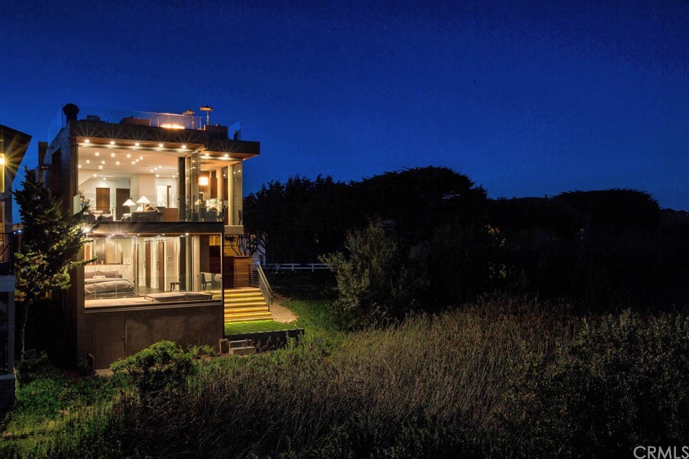 1839 Strand Way Oceano, CA 93445 - Photo 2 of 47 a view of a house with a yard
