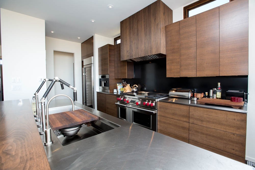 1839 Strand Way Oceano, CA 93445 - Photo 23 of 47 a kitchen with stove and cabinets