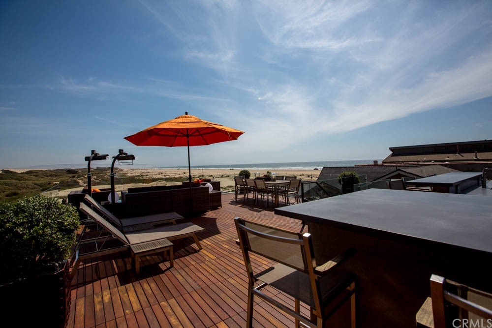 1839 Strand Way Oceano, CA 93445 - Photo 28 of 47 a terrace with outdoor seating and city view