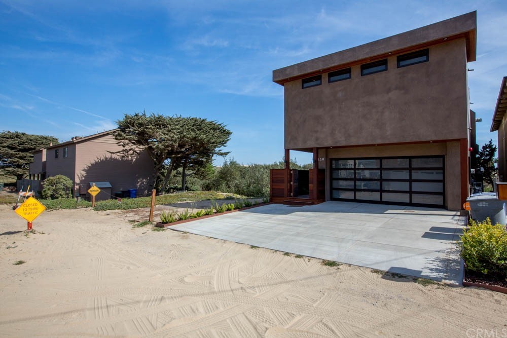 1839 Strand Way Oceano, CA 93445 - Photo 33 of 47 a house view with a backyard space