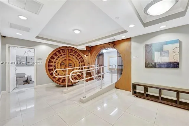 a view of an entryway with wooden floor