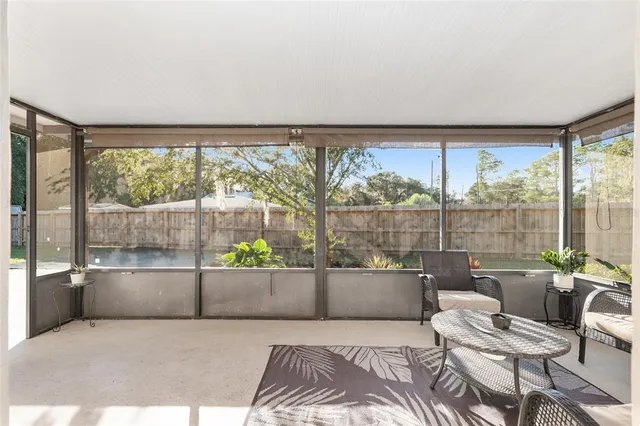 a view of a backyard of the house