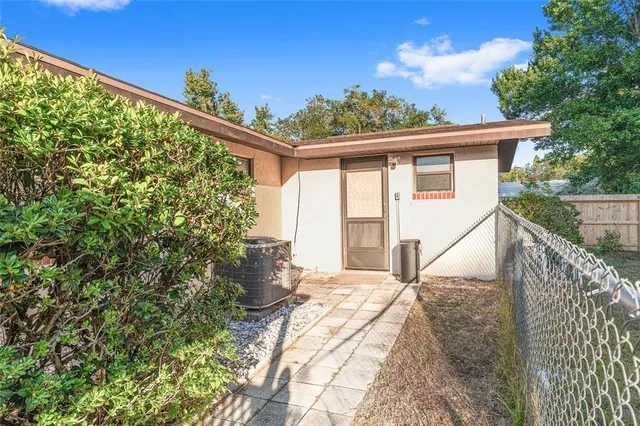 a view of a backyard with green space