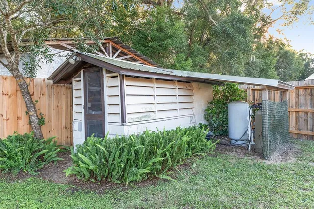 a view of a yard with an outdoor space