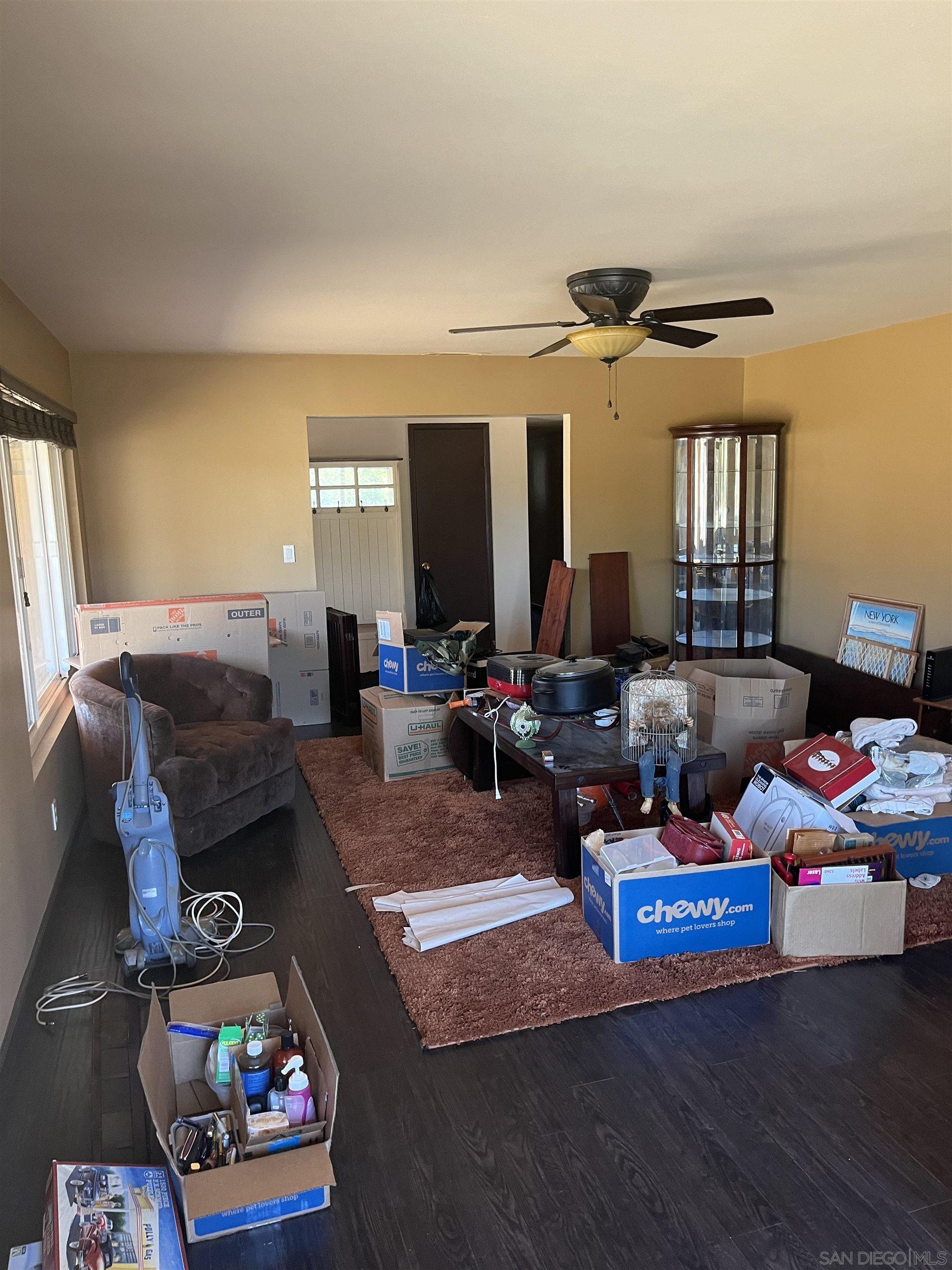 1407 Taylor Vista Vista, CA 92084 - Photo 11 of 28 a living room with furniture and a fireplace