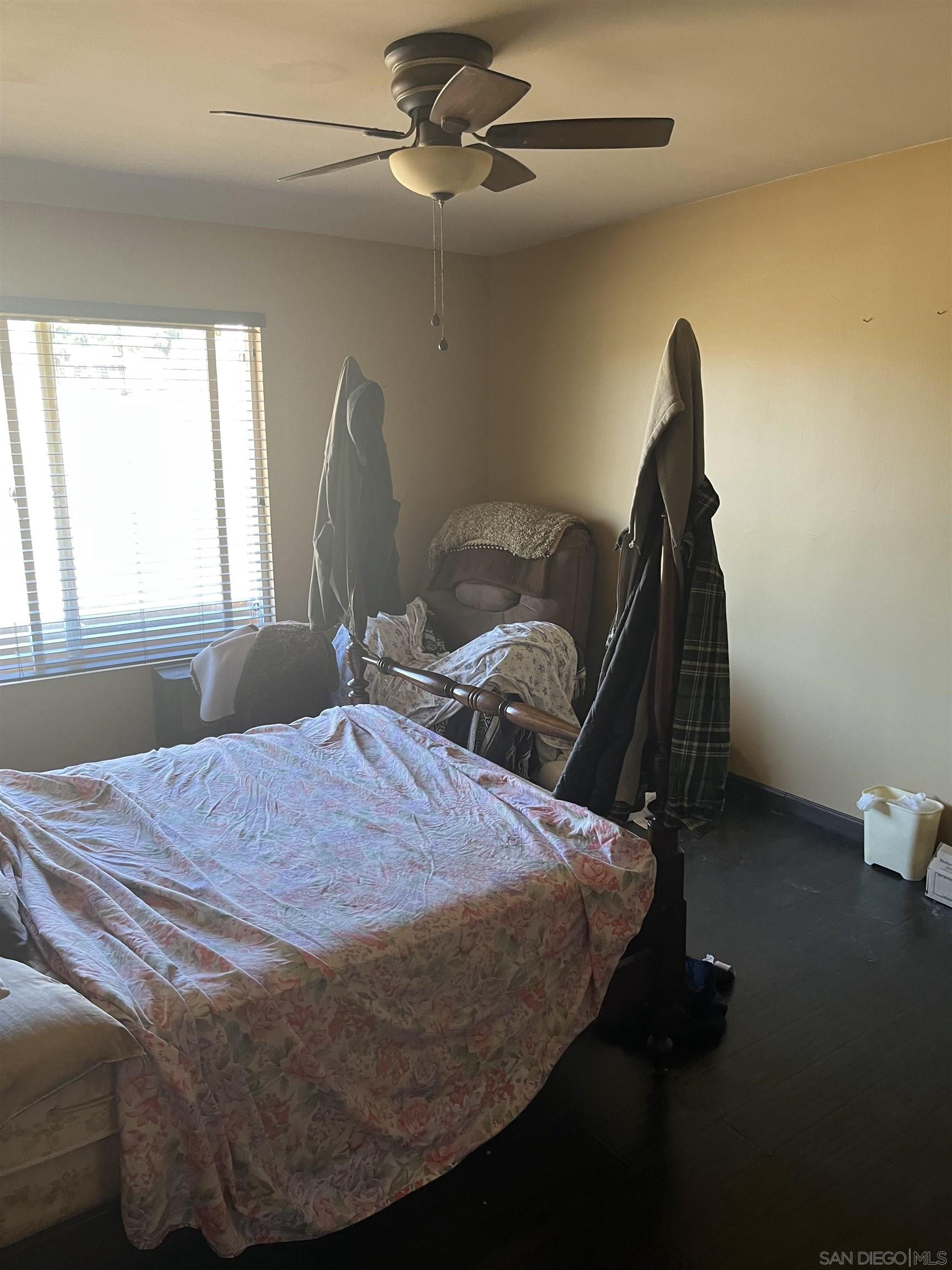 1407 Taylor Vista Vista, CA 92084 - Photo 16 of 28 a bedroom with a bed and a window